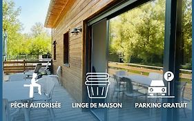Chalet avec terrasse sur pilotis vue sur l'étang